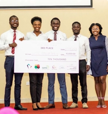 The Waste Gobbler Team holding GHC10,000 prize award At The 2022 ACAIC.